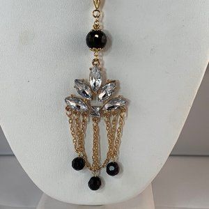 Gold Tone Chain Necklace With A Clear & Black Crystal Chandelier Pendant (NA29)